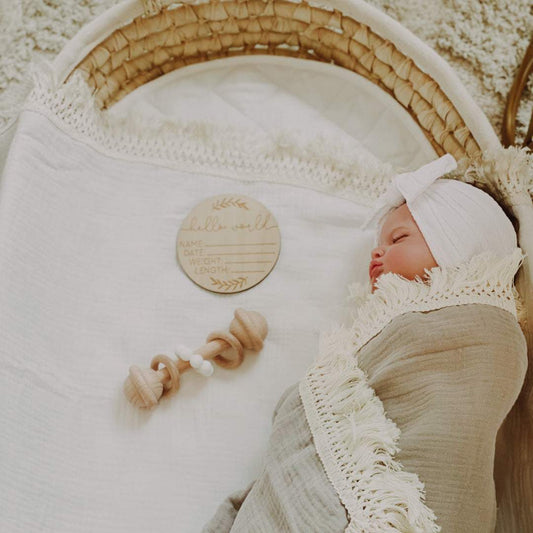 Grey baby fringe swaddle. Newborn baby swaddle. Baby muslin wrap. Baby blanket. Organic cotton baby wrap